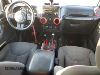 2018 Jeep Wrangler JK Unlimited Sport S with VIN 1C4BJWDG2JL874348, listed as a Copart auction lot 77430104 with 115,813 mi miles and Salvage Title. Bid and sale history available at carsss.com. Image 8.