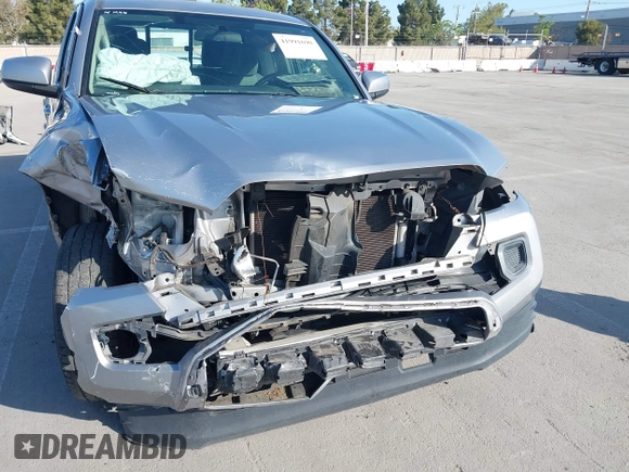 2017 Toyota Tacoma SR with VIN 5TFSX5EN9HX054583, listed as a IAAI auction lot 41991690 with 129,524 mi miles and . Bid and sale history available at DreamBid. Image 6.