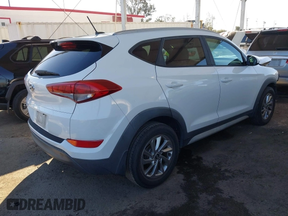 2017 Hyundai Tucson SE with VIN KM8J33A43HU464978, listed as a IAAI auction lot 41655832 with 135,359 mi miles. Bid and sale history available at carsss.com. Image 4.