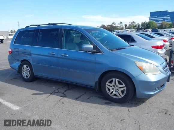 2006 Honda Odyssey EX-L z VIN 5FNRL38706B075356, wystawiony jako IAAI lot #42021960 z przebiegiem 120 455 mil mil oraz . Historia ofert i sprzedaży dostępna na DreamBid. Obrazek 13.