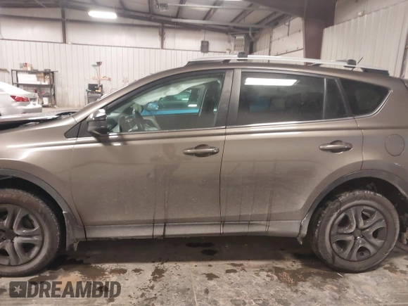 2014 Toyota RAV4 LE with VIN 2T3BFREV3EW140059, listed as a IAAI auction lot 41613214 with 168,165 mi miles and . Bid and sale history available at DreamBid. Image 14.