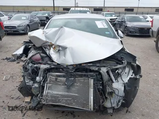 2018 Chevrolet Malibu LT z VIN 1G1ZD5ST6JF261270, wystawiony jako IAAI lot #41932928 z przebiegiem 127 971 mil mil oraz . Historia ofert i sprzedaży dostępna na DreamBid. Obrazek 12.