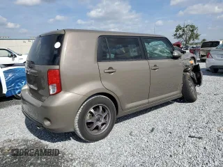 2014 Scion xB z VIN JTLZE4FE5EJ061689, wystawiony jako Copart lot #55420885 z przebiegiem 96 970 mil mil oraz Szkoda całkowita • Salvage title. Historia ofert i sprzedaży dostępna na DreamBid. Obrazek 3.
