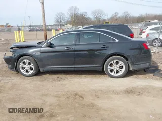 2013 Ford Taurus SEL with VIN 1FAHP2E84DG188503, listed as a IAAI auction lot 41800277 with 215,015 mi miles. Bid and sale history available at carsss.com. Image 14.