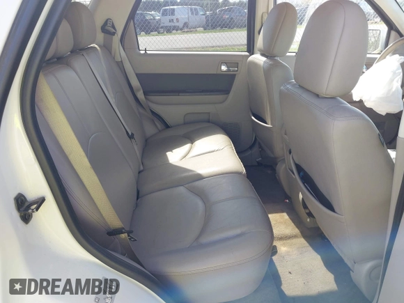 2010 Mercury Mariner Premier with VIN 4M2CN9H7XAKJ26886, listed as a IAAI auction lot 42027825 with 149,561 mi miles and . Bid and sale history available at DreamBid. Image 8.