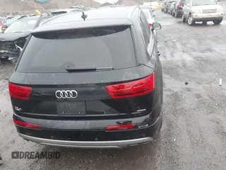 2019 Audi Q7 Premium with VIN WA1AHAF74KD029904, listed as a IAAI auction lot 41024012 with 79,896 mi miles and . Bid and sale history available at DreamBid. Image 16.