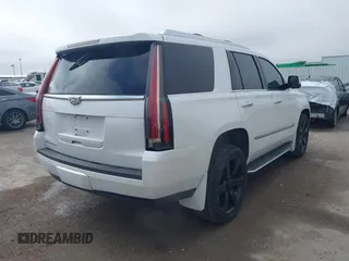 2016 Cadillac Escalade Luxury Collection with VIN 1GYS4BKJ2GR156944, listed as a IAAI auction lot 41644192 with 135,862 mi miles. Bid and sale history available at carsss.com. Image 4.