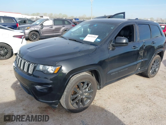 2018 Jeep Grand Cherokee Laredo E with VIN 1C4RJEAG4JC311699, listed as a IAAI auction lot 41876920 with 42,584 mi miles and . Bid and sale history available at DreamBid. Image 17.