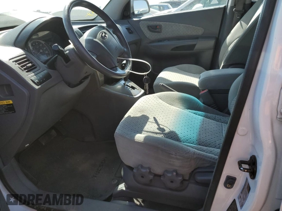 2005 Hyundai Tucson GLS with VIN KM8JN72D75U169698, listed as a Copart auction lot 71572094 with 149,706 mi miles and Salvage Title. Bid and sale history available at carsss.com. Image 7.