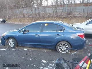 2012 Subaru Impreza Sedan 2.0i Premium with VIN JF1GJAC67CH026205, listed as a IAAI auction lot 41885332 with 151,048 mi miles. Bid and sale history available at carsss.com. Image 15.