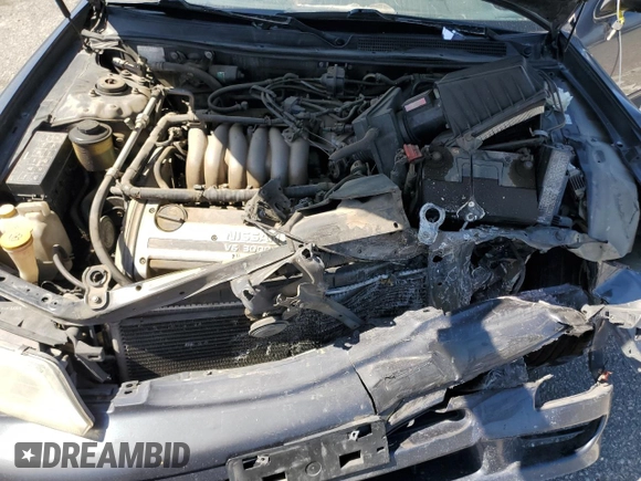 1999 Nissan Maxima GXE z VIN JN1CA21D9XM409448, wystawiony jako Copart lot #51822895 z przebiegiem Nie podano mil oraz Szkoda całkowita • Salvage title. Historia ofert i sprzedaży dostępna na DreamBid. Obrazek 13.