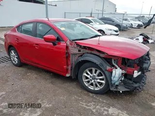 2014 Mazda 3 i Touring z VIN JM1BM1V75E1148848, wystawiony jako IAAI lot #42200934 z przebiegiem 134 176 mil mil oraz . Historia ofert i sprzedaży dostępna na DreamBid. Obrazek 1.