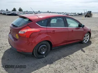 2014 Ford Focus Titanium with VIN 1FADP3N21EL421469, listed as a Copart auction lot 59744685 with 68,436 mi miles and Salvage title. Bid and sale history available at DreamBid. Image 3.