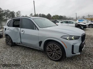 2024 BMW X5 xDrive40i with VIN 5UX23EU03R9V82643, listed as a Copart auction lot 50187785 with 5,918 mi miles and Salvage Title. Bid and sale history available at carsss.com. Image 4.