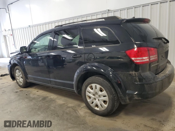 2017 Dodge Journey SE with VIN 3C4PDCAB4HT704902, listed as a Copart auction lot 51410815 with 153,976 mi miles and Salvage Title. Bid and sale history available at DreamBid. Image 2.