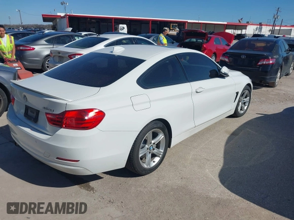 2014 BMW 4 Series 428i xDrive with VIN WBA3N9C58EF721369, listed as a IAAI auction lot 41768891 with 181,068 mi miles and . Bid and sale history available at DreamBid. Image 4.