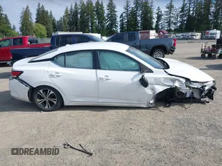 2022 Nissan Sentra SV z VIN 3N1AB8CV1NY272528, wystawiony jako IAAI lot #42344178 z przebiegiem 50 569 mil mil oraz . Historia ofert i sprzedaży dostępna na DreamBid. Obrazek 13.