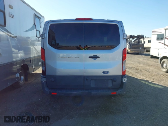 2017 Ford Transit z VIN 1FTYR2YMXHKA63019, wystawiony jako IAAI lot #41613283 z przebiegiem 182 946 mil mil oraz . Historia ofert i sprzedaży dostępna na DreamBid. Obrazek 16.