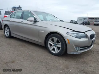 2013 BMW 5 Series 528i xDrive with VIN WBAXH5C54DD109052, listed as a IAAI auction lot 42054381 with 145,931 mi miles. Bid and sale history available at carsss.com. Image 1.