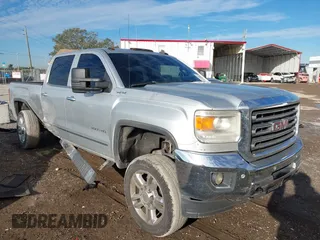 2015 GMC Sierra 2500HD available WiFi SLT with VIN 1GT12ZEG7FF167096, listed as a IAAI auction lot 41408317 with 152,969 mi miles. Bid and sale history available at carsss.com. Image 1.
