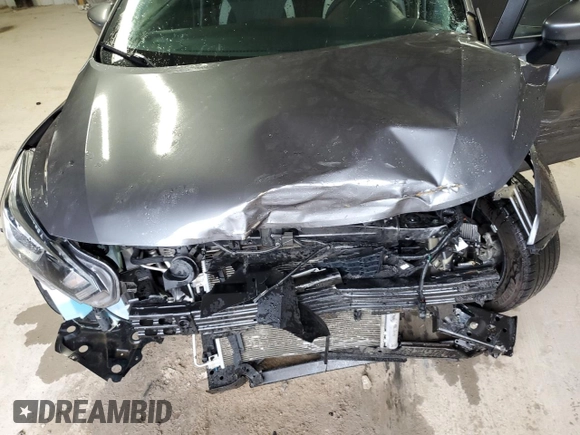 2022 Nissan Versa SV z VIN 3N1CN8EV5NL848664, wystawiony jako Copart lot #58550235 z przebiegiem 56 891 mil mil oraz Szkoda całkowita • Salvage title. Historia ofert i sprzedaży dostępna na DreamBid. Obrazek 11.