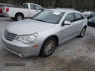 2009 Chrysler Sebring Touring with VIN 1C3LC56BX9N517563, listed as a IAAI auction lot 41853411 with 194,215 mi miles and . Bid and sale history available at DreamBid. Image 2.