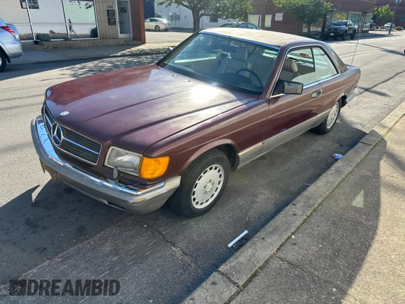 1986 Mercedes-Benz 560 with VIN WDBCA45D2GA206016, listed as a Copart auction lot 54577205 with 205,332 mi miles and Clean Title. Bid and sale history available at DreamBid. Image 2.