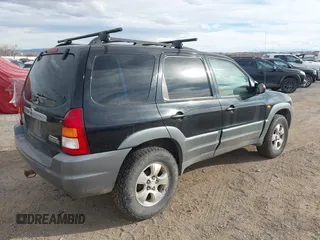 2001 Mazda Tribute LX with VIN 4F2CU08191KM27990, listed as a IAAI auction lot 41487001 with 209,394 mi miles and . Bid and sale history available at carsss.com. Image 4.