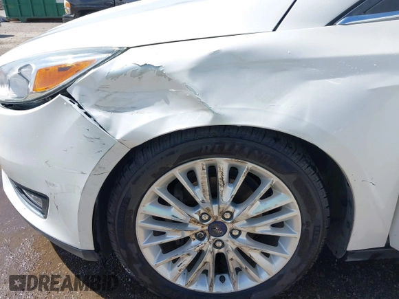2015 Ford Focus Titanium с VIN 1FADP3J27FL341102, выставлен на аукционе IAAI как лот 41793450 с пробегом 96 465 миль миль и . История ставок и продаж доступна на DreamBid. Изображение 6.