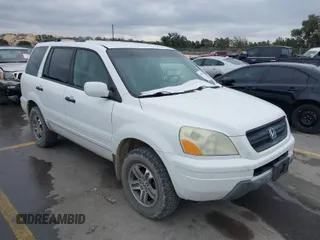 2004 Honda Pilot EX with VIN 2HKYF18464H503605, listed as a IAAI auction lot 41373673 with 112,919 mi miles and . Bid and sale history available at carsss.com. Image 1.
