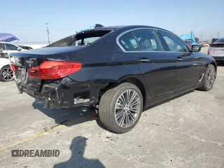 2018 BMW 5 Series 530i with VIN WBAJA5C52JWA36440, listed as a Copart auction lot 63325515 with 8,786 mi miles and Salvage title. Bid and sale history available at DreamBid. Image 3.