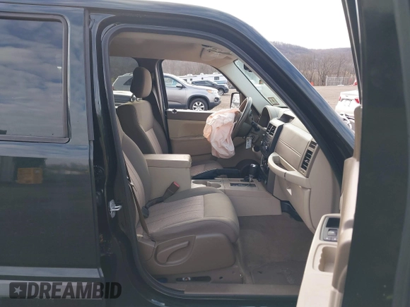 2012 Jeep Liberty Sport with VIN 1C4PJMAKXCW153053, listed as a IAAI auction lot 41728329 with 81,866 mi miles and . Bid and sale history available at DreamBid. Image 5.