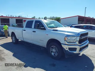 2021 Ram 2500 Tradesman z VIN 3C6UR4HJ3MG501081, wystawiony jako IAAI lot #41853135 z przebiegiem 70 421 mil mil oraz . Historia ofert i sprzedaży dostępna na DreamBid. Obrazek 1.