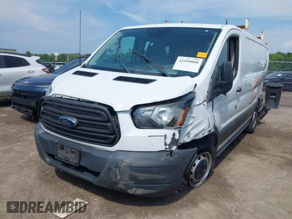 2016 Ford Transit Cargo with VIN 1FTYE1ZM6GKA84050, listed as a IAAI auction lot 42599008 with 135,943 mi miles and . Bid and sale history available at DreamBid. Image 2.