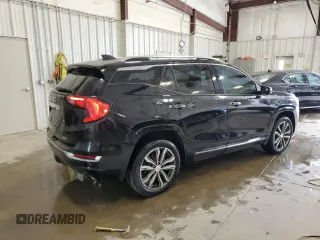 2018 GMC Terrain Denali z VIN 3GKALXEX9JL314152, wystawiony jako Copart lot #56932235 z przebiegiem 83 805 mil mil oraz Czysty tytuł • Clean title. Historia ofert i sprzedaży dostępna na DreamBid. Obrazek 3.