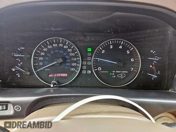 2004 Lexus LX 470 z VIN JTJHT00W743542910, wystawiony jako Copart lot #57187445 z przebiegiem 236 985 mil mil oraz Szkoda całkowita • Salvage title. Historia ofert i sprzedaży dostępna na DreamBid. Obrazek 9.