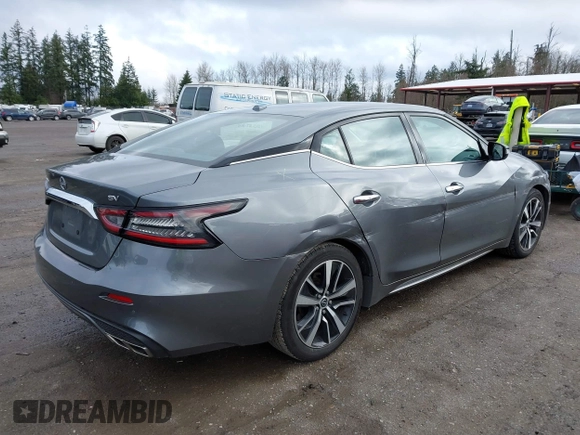 2023 Nissan Maxima SV with VIN 1N4AA6CV4PC512497, listed as a IAAI auction lot 41760990 with 32,400 mi miles and . Bid and sale history available at DreamBid. Image 4.