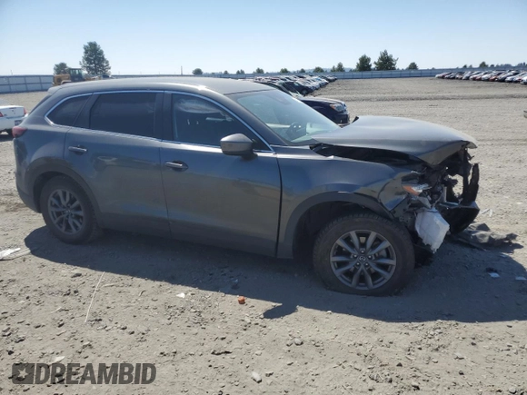 2021 Mazda CX-9 Sport with VIN JM3TCBBY9M0527244, listed as a Copart auction lot 64231384 with Not Provided miles and Salvage Title. Bid and sale history available at DreamBid. Image 4.
