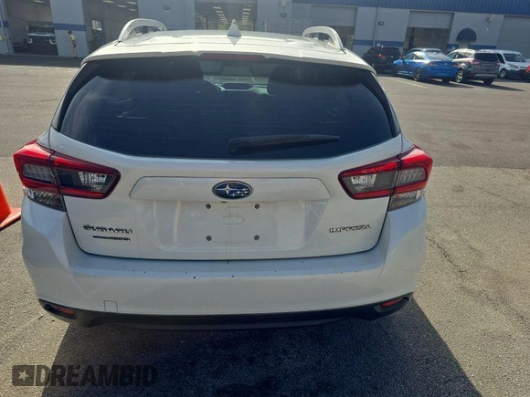 2020 Subaru Impreza Premium with VIN 4S3GTAV65L3703587, listed as a IAAI auction lot 42677825 with 113,969 mi miles and . Bid and sale history available at DreamBid. Image 4.