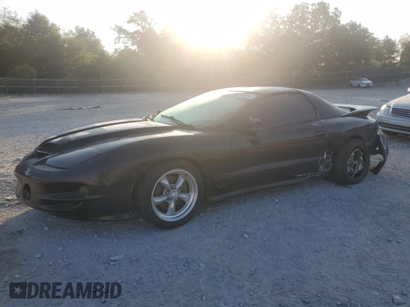 2000 Pontiac Firebird Formula z VIN 2G2FV22G4Y2175318, wystawiony jako Copart lot #68737224 z przebiegiem 229 394 mil mil oraz Szkoda całkowita • Salvage title. Historia ofert i sprzedaży dostępna na DreamBid. Obrazek 1.