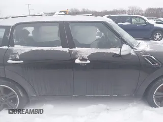 2016 MINI Countryman S with VIN WMWZC3C56GWT11105, listed as a IAAI auction lot 41228246 with 102,971 mi miles and . Bid and sale history available at DreamBid. Image 13.
