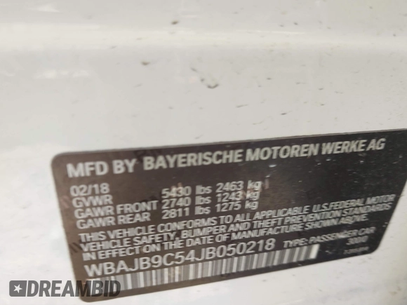 2018 BMW 5 Series M550i xDrive with VIN WBAJB9C54JB050218, listed as a IAAI auction lot 41132695 with 69,659 mi miles. Bid and sale history available at carsss.com. Image 9.