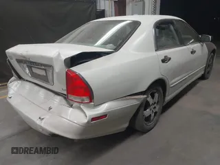 2003 Mitsubishi Diamante LS z VIN 6MMAP67P13T012396, wystawiony jako IAAI lot #40668729 z przebiegiem 157 250 mil mil oraz . Historia ofert i sprzedaży dostępna na DreamBid. Obrazek 4.