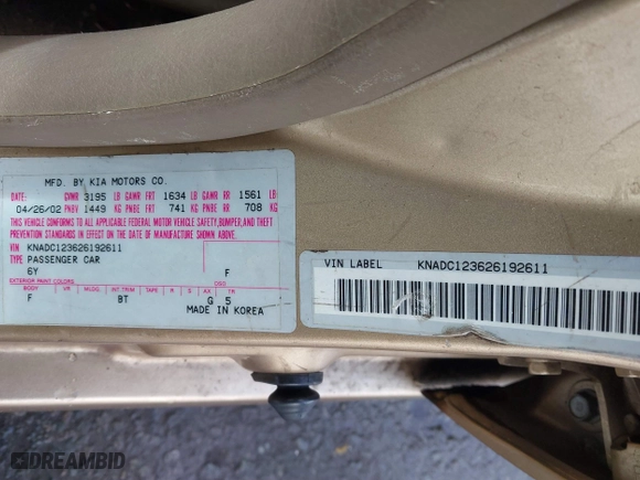 2002 Kia Rio with VIN KNADC123626192611, listed as a IAAI auction lot 41765104 with 62,387 mi miles. Bid and sale history available at carsss.com. Image 9.