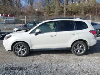2017 Subaru Forester Touring with VIN JF2SJAWC0HH550052, listed as a IAAI auction lot 41475102 with 115,600 mi miles and . Bid and sale history available at DreamBid. Image 14.