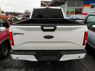 2015 Ford F-150 XLT w/HD Payload Pkg with VIN 1FTFW1EG8FFA12438, listed as a IAAI auction lot 41743982 with 174,799 mi miles. Bid and sale history available at carsss.com. Image 16.