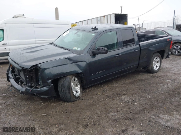 2018 Chevrolet Silverado 1500 LT with VIN 1GCVKREC9JZ200573, listed as a IAAI auction lot 41656239 with 74,000 mi miles. Bid and sale history available at carsss.com. Image 2.