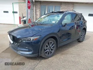 2018 Mazda CX-5 Grand Touring with VIN JM3KFADM1J1439544, listed as a IAAI auction lot 41891134 with 54,132 mi miles and . Bid and sale history available at DreamBid. Image 17.