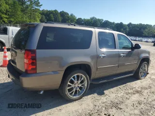 2013 Chevrolet Suburban LS with VIN 1GNSCHE04DR274687, listed as a Copart auction lot 67646174 with 184,268 mi miles and Salvage Title. Bid and sale history available at carsss.com. Image 3.