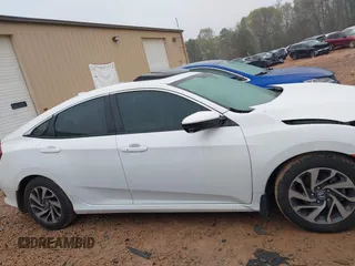 2018 Honda Civic EX with VIN 2HGFC2F77JH576099, listed as a IAAI auction lot 41924628 with 100,998 mi miles and . Bid and sale history available at DreamBid. Image 13.